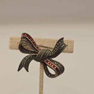 Elegant Bow Brooch with Red Accents